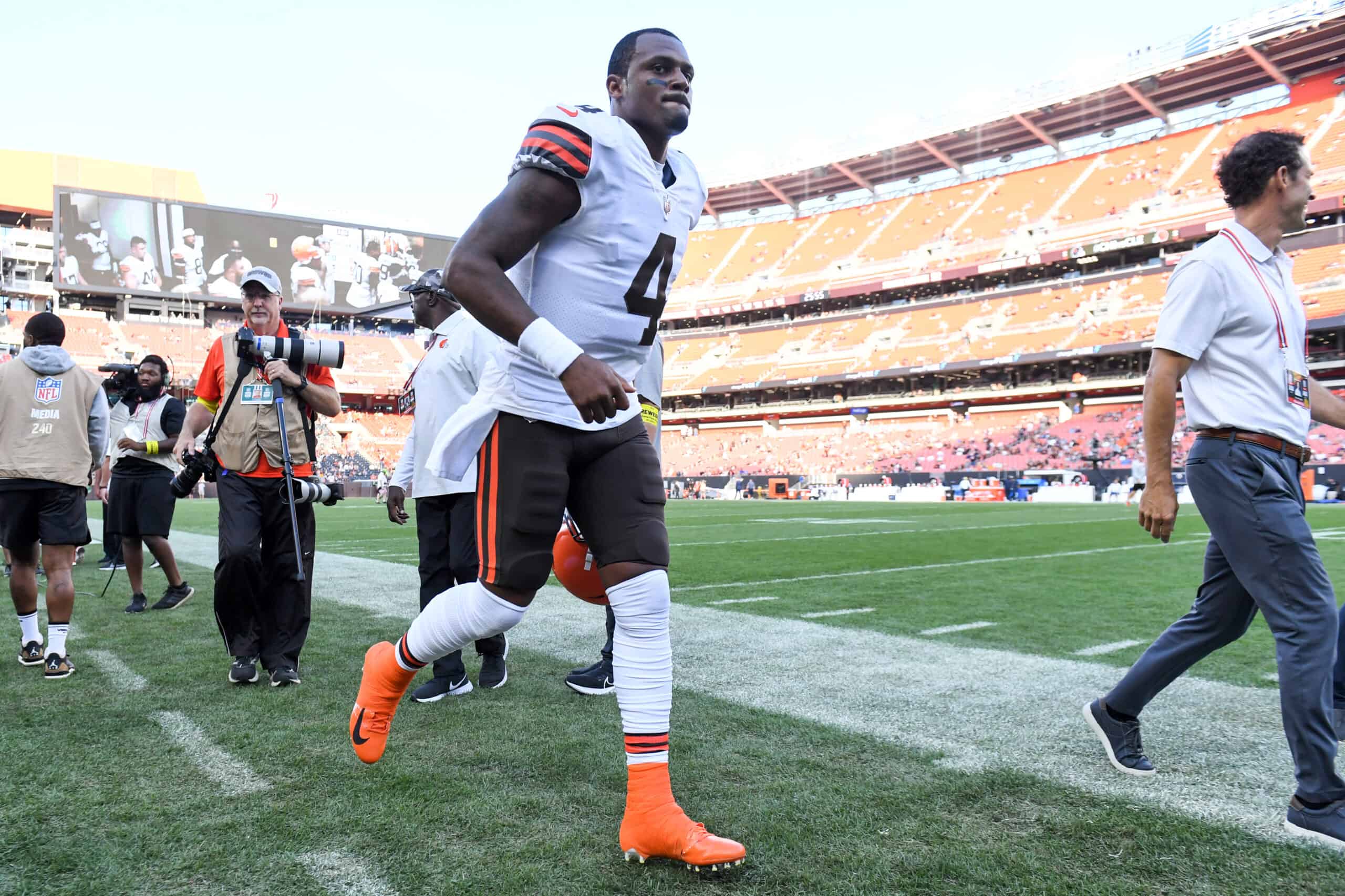 Deshaun Watson #4 of the Cleveland Browns runs off the field prior to a preseason game against the Chicago Bears at FirstEnergy Stadium on August 27, 2022 in Cleveland, Ohio.