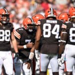 Jacoby Brissett #7 of the Cleveland Browns huddles his team during the first quarter against the New England Patriots at FirstEnergy Stadium on October 16, 2022 in Cleveland, Ohio