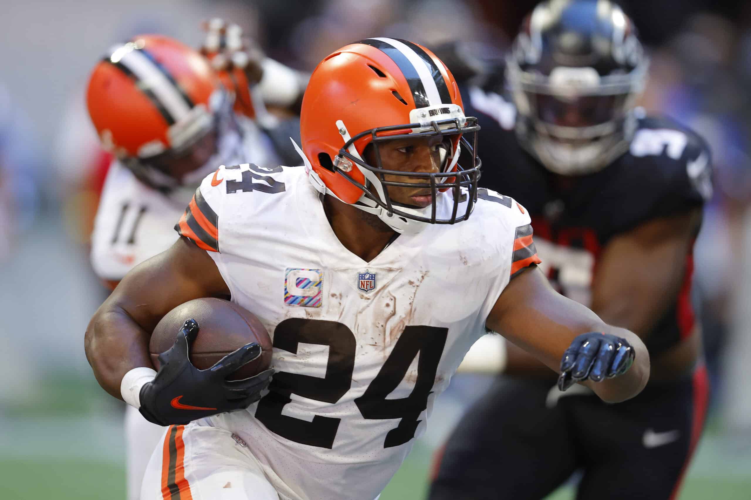 Nick Chubb #24 of the Cleveland Browns runs with the ball during the fourth quarter against the Atlanta Falcons at Mercedes-Benz Stadium on October 02, 2022 in Atlanta, Georgia.