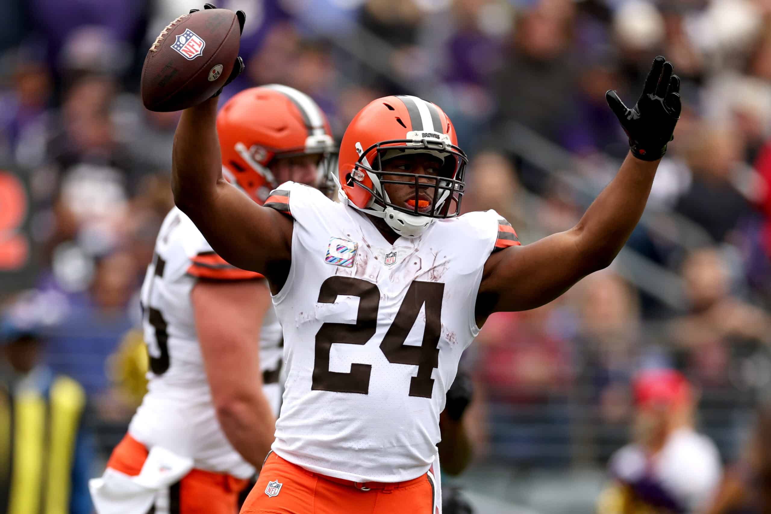 Nick Chubb #24 of the Cleveland Browns celebrates after a touchdown during the first quarter of the game against the Baltimore Ravens at M&T Bank Stadium on October 23, 2022 in Baltimore, Maryland. 