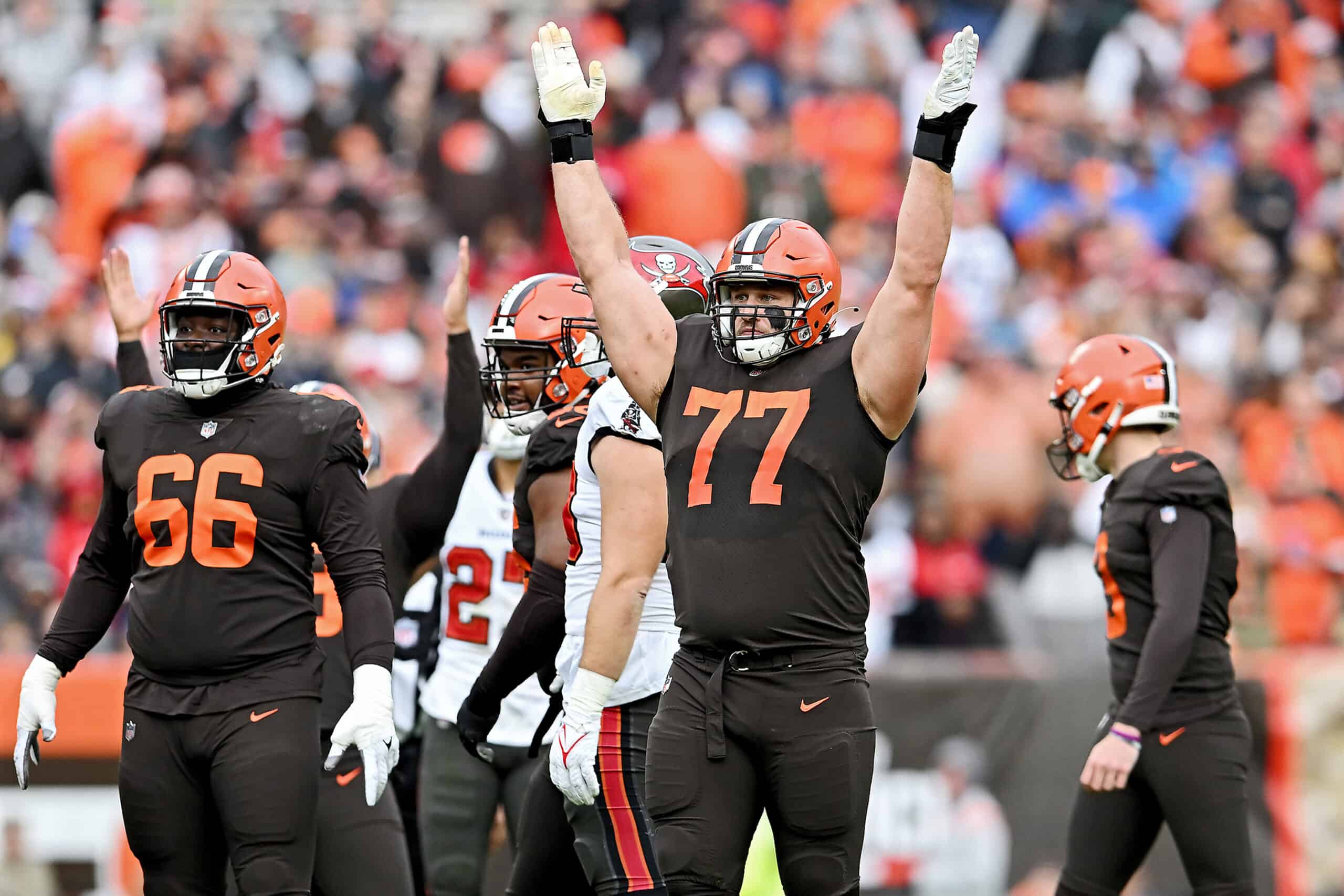 Wyatt Teller #77 celebrates a field goal by Cade York #3 of the Cleveland Browns during the first half against the Tampa Bay Buccaneers at FirstEnergy Stadium on November 27, 2022 in Cleveland, Ohio.