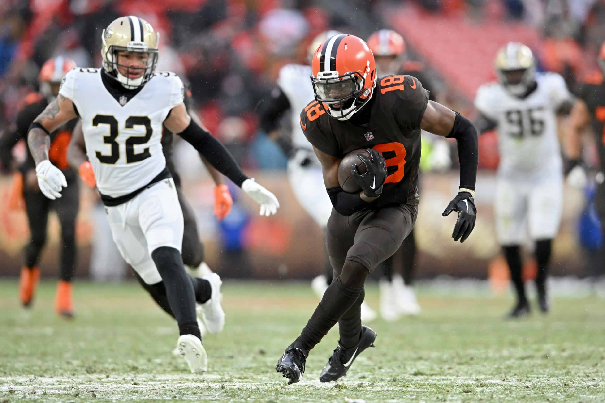 David Bell #18 of the Cleveland Browns carries the ball against the New Orleans Saints during the second half of the game at FirstEnergy Stadium on December 24, 2022 in Cleveland, Ohio.