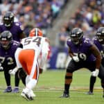 Guard Ben Powers #72 and offensive tackle Ronnie Stanley #79 of the Baltimore Ravens line up against linebacker Deion Jones #54 of the Cleveland Browns at M&T Bank Stadium on October 23, 2022 in Baltimore, Maryland.