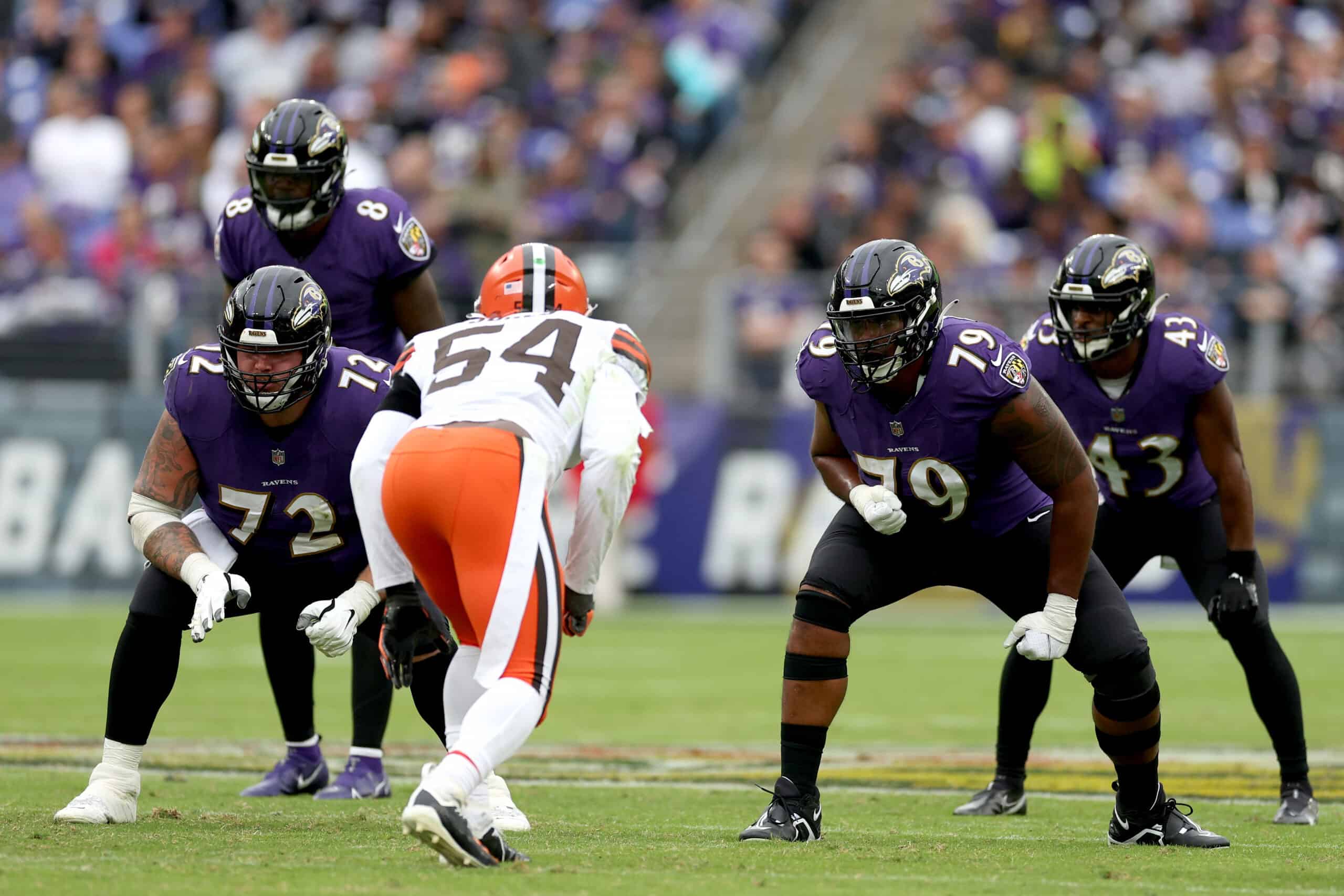 Guard Ben Powers #72 and offensive tackle Ronnie Stanley #79 of the Baltimore Ravens line up against linebacker Deion Jones #54 of the Cleveland Browns at M&T Bank Stadium on October 23, 2022 in Baltimore, Maryland. 