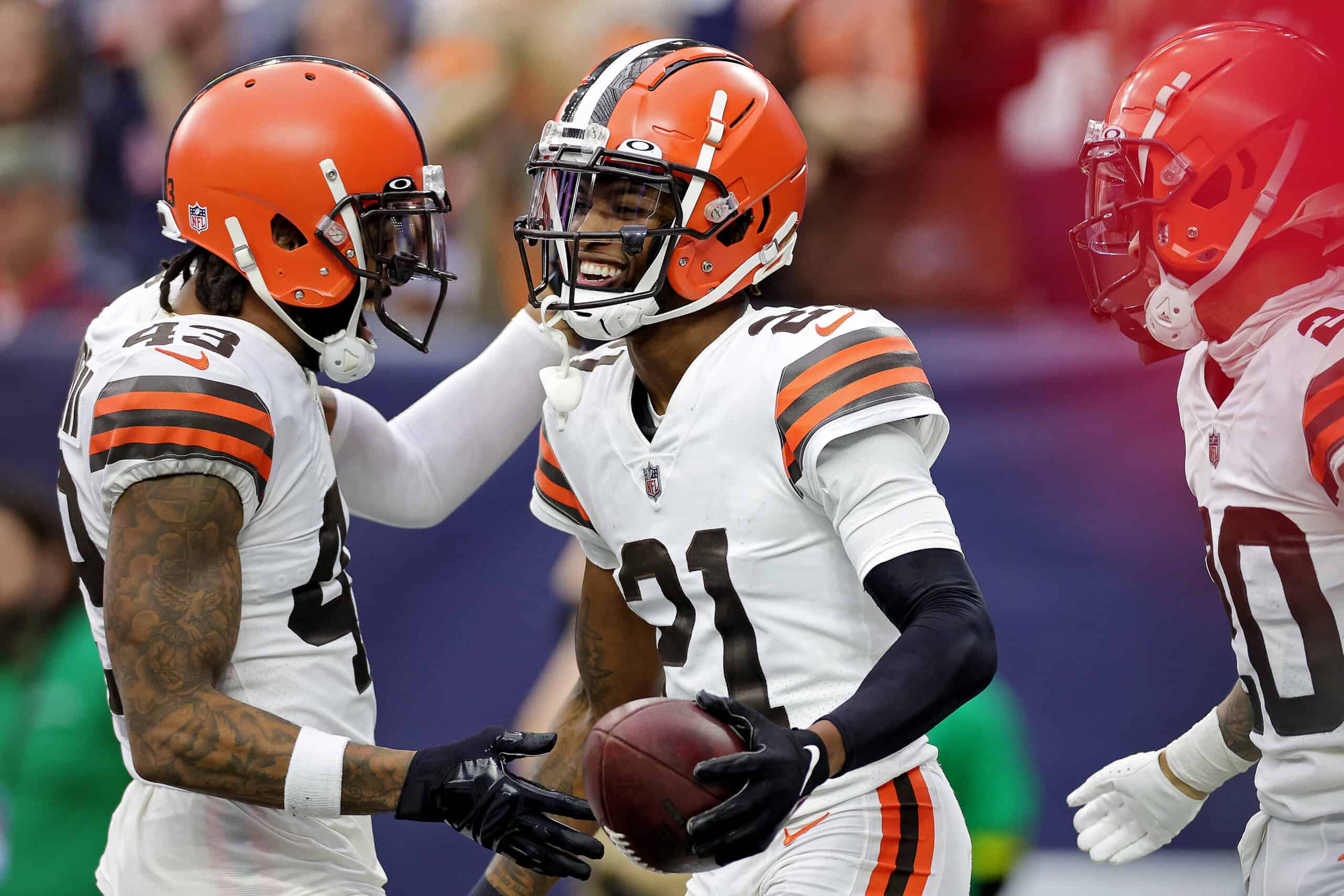 Denzel Ward #21 of the Cleveland Browns celebrates after his fumble recovery for a touchdown during the third quarter against the Houston Texans at NRG Stadium on December 04, 2022 in Houston, Texas.