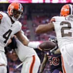 Deshaun Watson #4 of the Cleveland Browns hands the ball off to Nick Chubb #24 of the Cleveland Browns during the second quarter against the Houston Texans at NRG Stadium on December 04, 2022 in Houston, Texas.