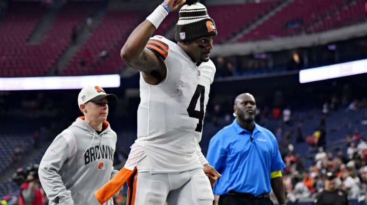 Deshaun Watson #4 of the Cleveland Browns gestures while running off the field following his team's 27-14 win over the Houston Texans at NRG Stadium on December 04, 2022 in Houston, Texas.