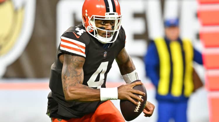 Deshaun Watson #4 of the Cleveland Browns scrambles against the Baltimore Ravens during the first quarter at FirstEnergy Stadium on December 17, 2022 in Cleveland, Ohio.