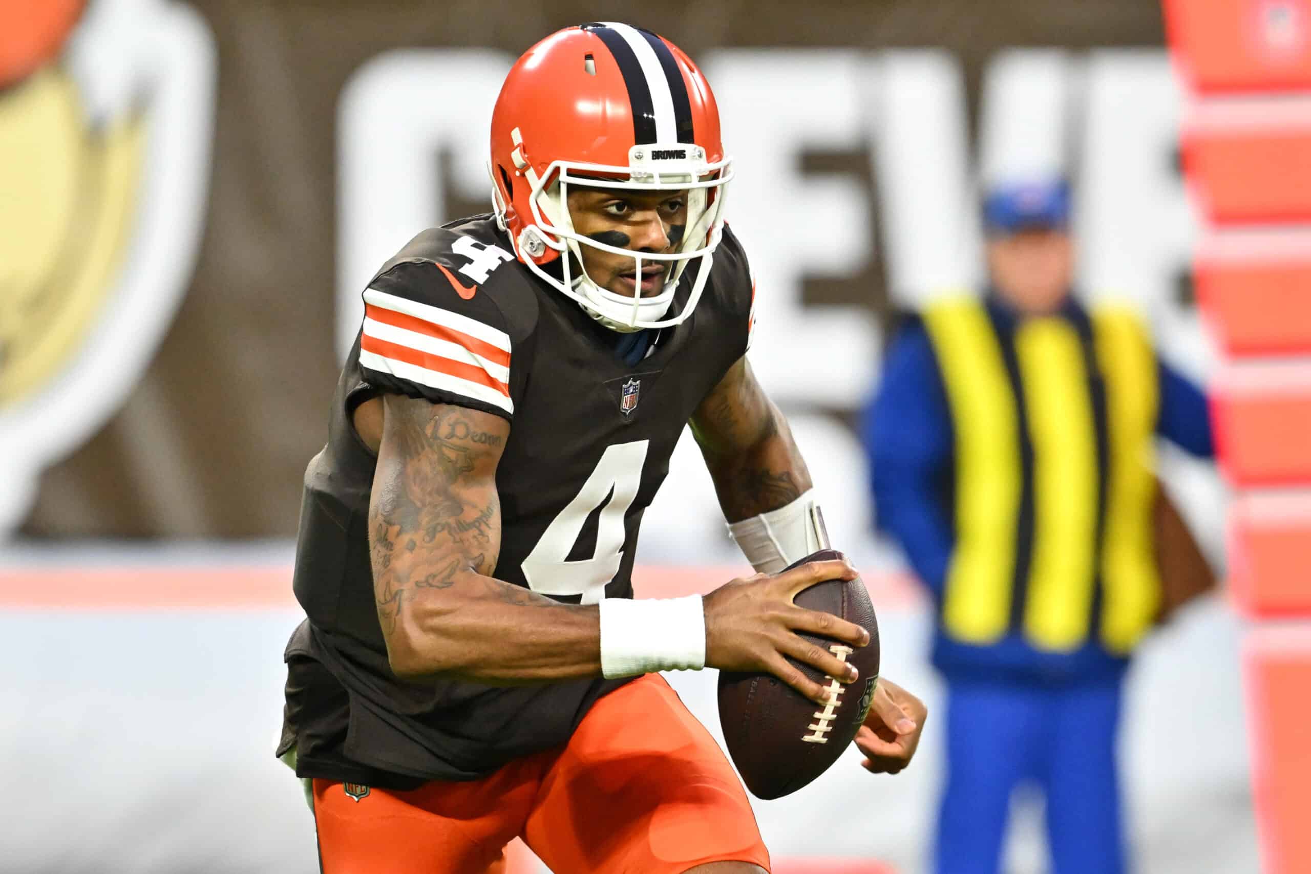 Deshaun Watson #4 of the Cleveland Browns scrambles against the Baltimore Ravens during the first quarter at FirstEnergy Stadium on December 17, 2022 in Cleveland, Ohio. 