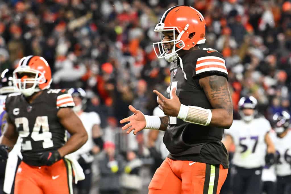  Deshaun Watson #4 of the Cleveland Browns celebrates following his touchdown pass against the Baltimore Ravens during the third quarter at FirstEnergy Stadium on December 17, 2022 in Cleveland, Ohio.