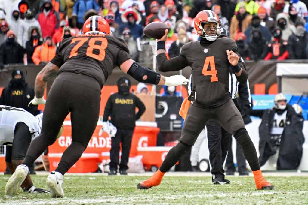 CLEVELAND, OHIO - DECEMBER 24: Deshaun Watson #4 of the Cleveland Browns throws the ball during the second half in the game against the New Orleans Saints at FirstEnergy Stadium on December 24, 2022 in Cleveland, Ohio.