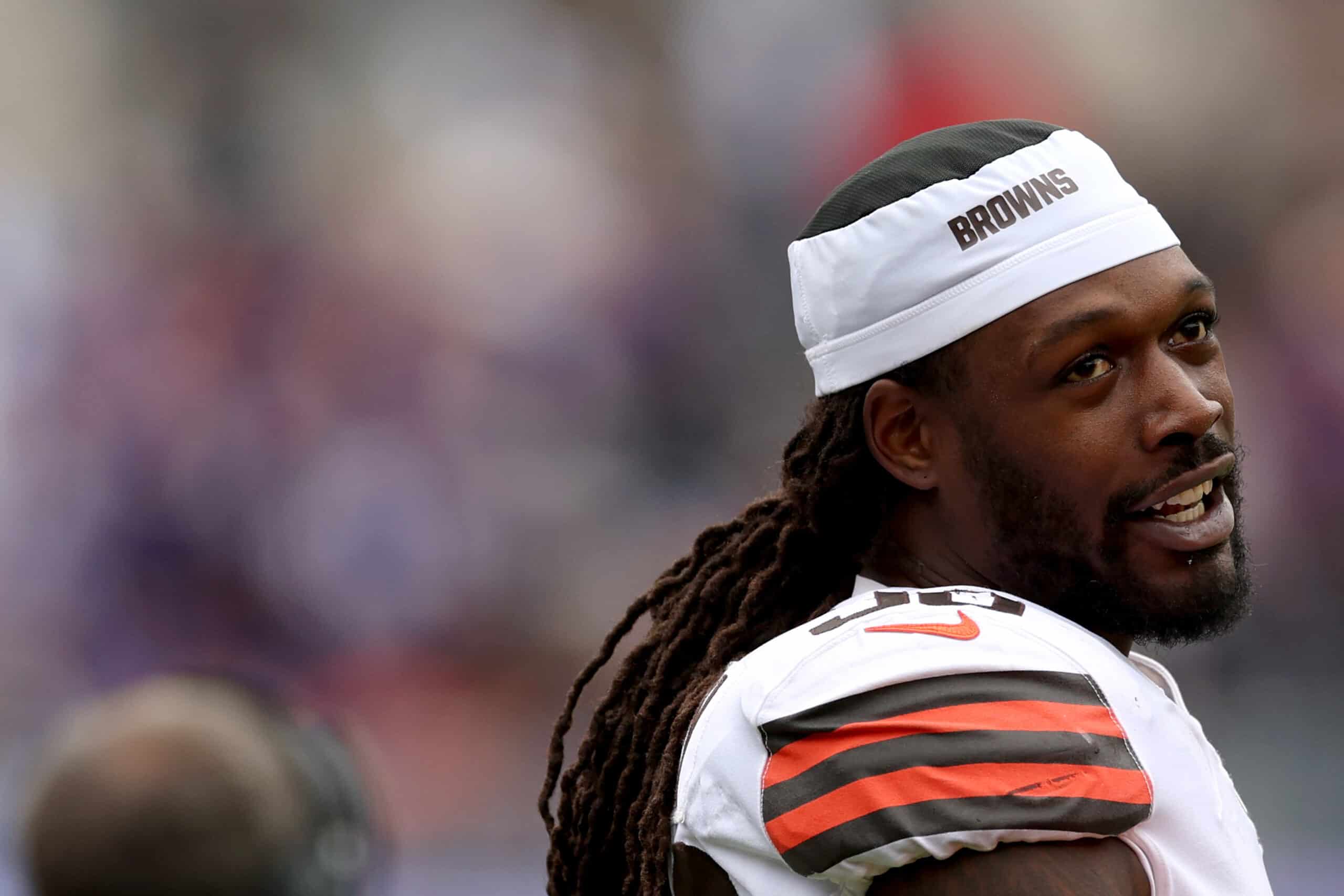 Defensive end Jadeveon Clowney #90 of the Cleveland Browns watches the first half from the sidelines against the Baltimore Ravens at M&T Bank Stadium on October 23, 2022 in Baltimore, Maryland.