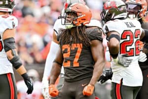 Kareem Hunt #27 of the Cleveland Browns celebrates during the first half against the Tampa Bay Buccaneers at FirstEnergy Stadium on November 27, 2022 in Cleveland, Ohio.