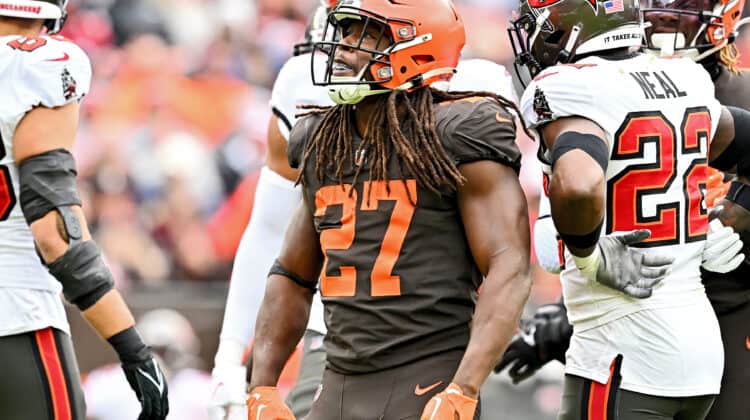 Kareem Hunt #27 of the Cleveland Browns celebrates during the first half against the Tampa Bay Buccaneers at FirstEnergy Stadium on November 27, 2022 in Cleveland, Ohio.