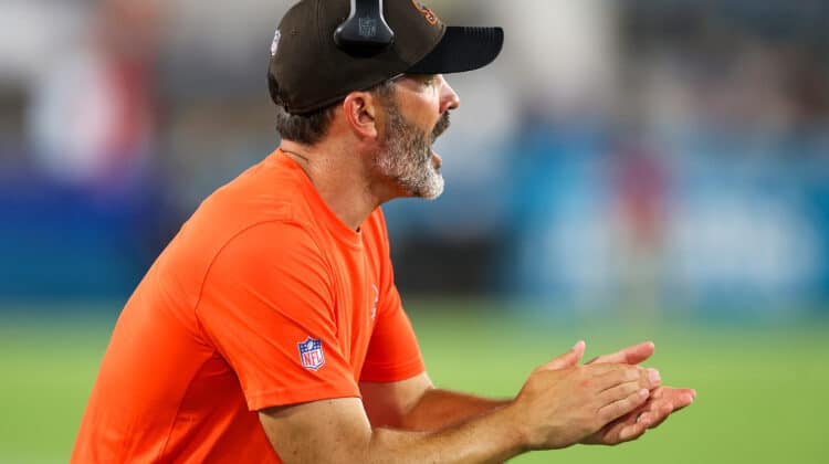 Head coach Kevin Stefanski of the Cleveland Browns encourages his team against the Jacksonville Jaguars during a football game at TIAA Bank Field on August 12, 2022 in Jacksonville, Florida.