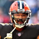 Myles Garrett #95 of the Cleveland Browns reacts before a game against the Tampa Bay Buccaneers at FirstEnergy Stadium on November 27, 2022 in Cleveland, Ohio.