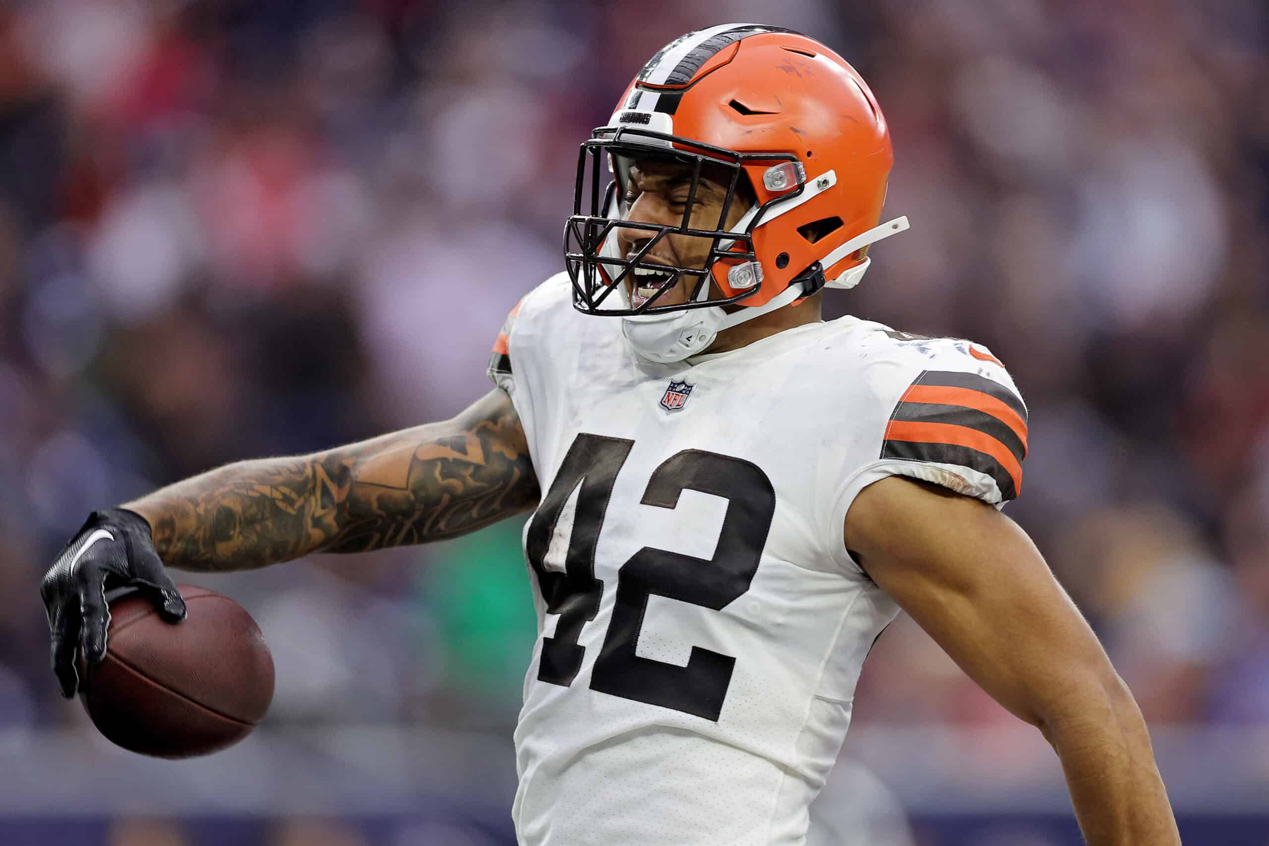 Tony Fields II #42 of the Cleveland Browns reacts while returning an interception for a touchdown during the fourth quarter against the Houston Texans at NRG Stadium on December 04, 2022 in Houston, Texas.