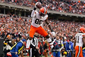 David Njoku #85 of the Cleveland Browns celebrates after scoring a touchdown in the third quarter of a game against the Cincinnati Bengals at Paycor Stadium on December 11, 2022 in Cincinnati, Ohio.