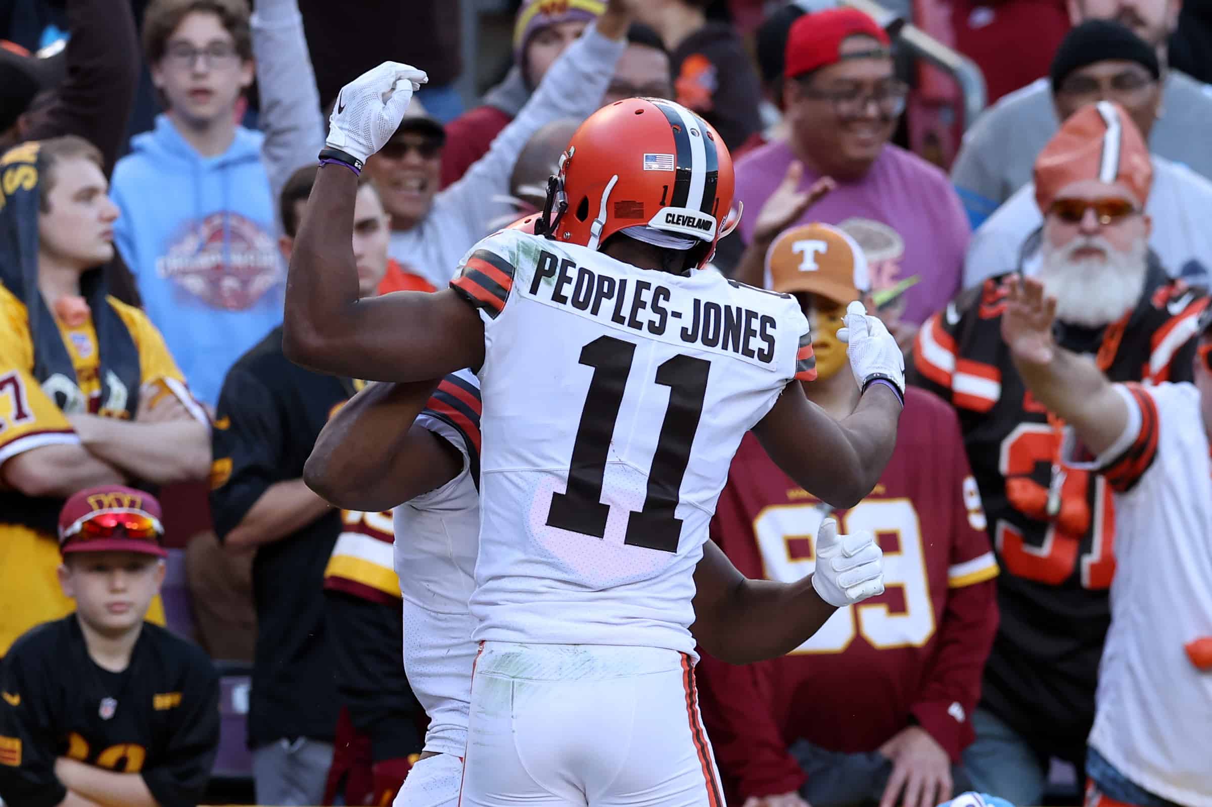 Amari Cooper #2 of the Cleveland Browns celebrates with Donovan Peoples-Jones #11 of the Cleveland Browns after scoring a touchdown during the fourth quarter against the Washington Commanders at FedExField on January 01, 2023 in Landover, Maryland.