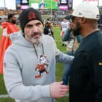 PITTSBURGH, PENNSYLVANIA - JANUARY 08: Head coach Kevin Stefanski of the Cleveland Browns talks with head coach Mike Tomlin of the Pittsburgh Steelers after the game at Acrisure Stadium on January 08, 2023 in Pittsburgh, Pennsylvania.