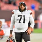 Offensive tackle Jedrick Wills Jr. #71 of the Cleveland Browns walks off the field after a preseason game against the Chicago Bears at FirstEnergy Stadium on August 27, 2022 in Cleveland, Ohio. The Bears defeated the Browns 21-20.