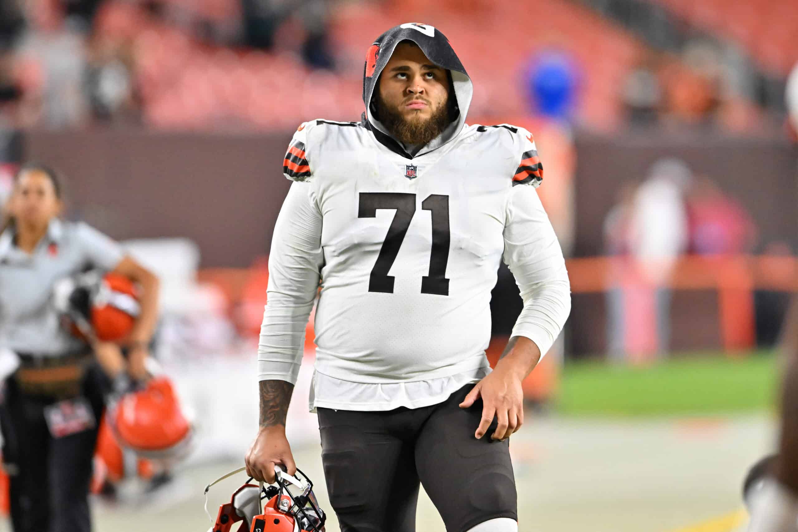 Offensive tackle Jedrick Wills Jr. #71 of the Cleveland Browns walks off the field after a preseason game against the Chicago Bears at FirstEnergy Stadium on August 27, 2022 in Cleveland, Ohio. The Bears defeated the Browns 21-20. 