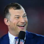 Former Cleveland Browns offensive lineman Joe Thomas talks with the NFL Network prior to the game between the New York Jets and the Cleveland Browns at FirstEnergy Stadium on September 20, 2018 in Cleveland, Ohio.
