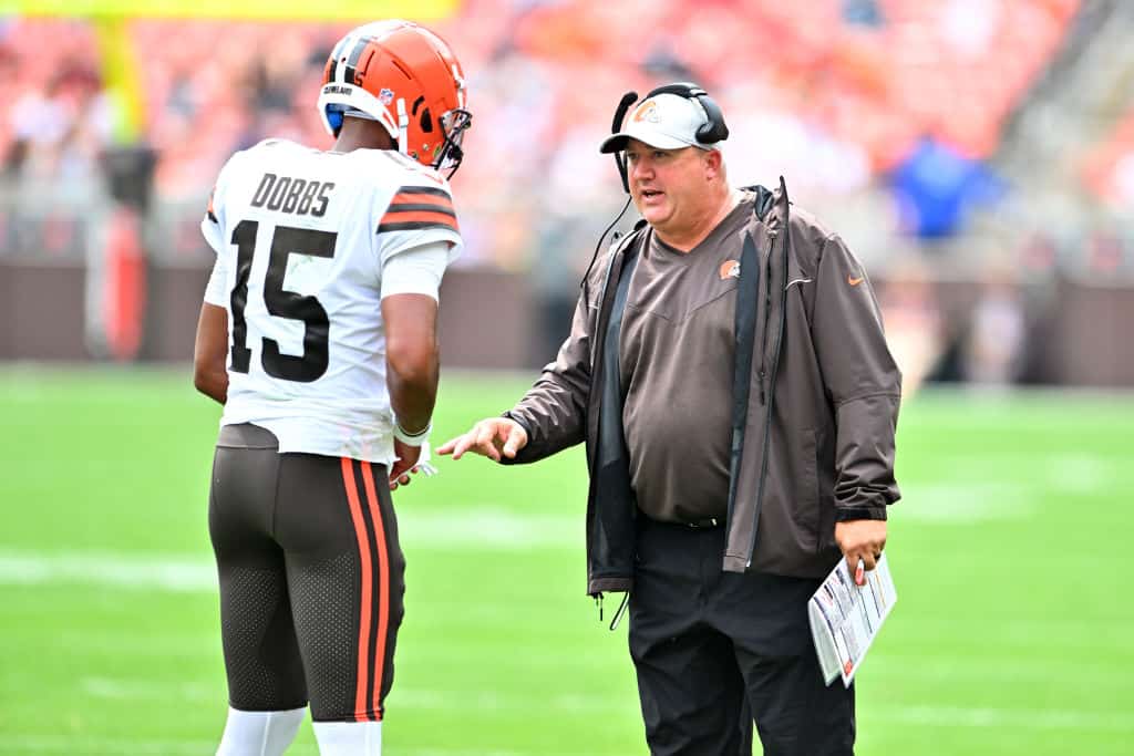 Quarterback Joshua Dobbs #15 talks with offensive coordinator Alex Van Pelt of the Cleveland Browns during the second quarter of a preseason game against the Philadelphia Eagles at FirstEnergy Stadium on August 21, 2022 in Cleveland, Ohio.