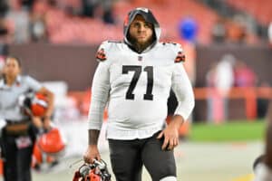 Offensive tackle Jedrick Wills Jr. #71 of the Cleveland Browns walks off the field after a preseason game against the Chicago Bears at FirstEnergy Stadium on August 27, 2022 in Cleveland, Ohio. The Bears defeated the Browns 21-20.