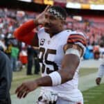 Myles Garrett #95 of the Cleveland Browns reacts to fans after the game against the Washington Commanders at FedExField on January 01, 2023 in Landover, Maryland.