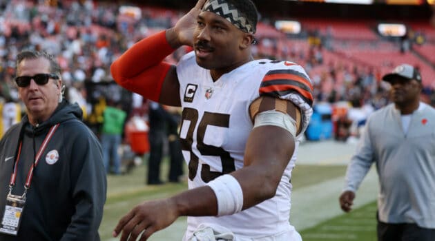 Myles Garrett #95 of the Cleveland Browns reacts to fans after the game against the Washington Commanders at FedExField on January 01, 2023 in Landover, Maryland.