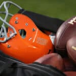 CHICAGO, IL - AUGUST 29: A Cleveland Browns helmet and footballs are seen in a ball bag during a game between the Brown and the Chicago Bears at Soldier Field on August 29, 2013 in Chicago, Illinois. The Browns defeated the Bears 18-16.