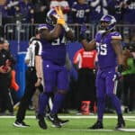 Dalvin Tomlinson #94 of the Minnesota Vikings reacts after a tackle during the third quarter against the New York Giants in the NFC Wild Card playoff game at U.S. Bank Stadium on January 15, 2023 in Minneapolis, Minnesota.