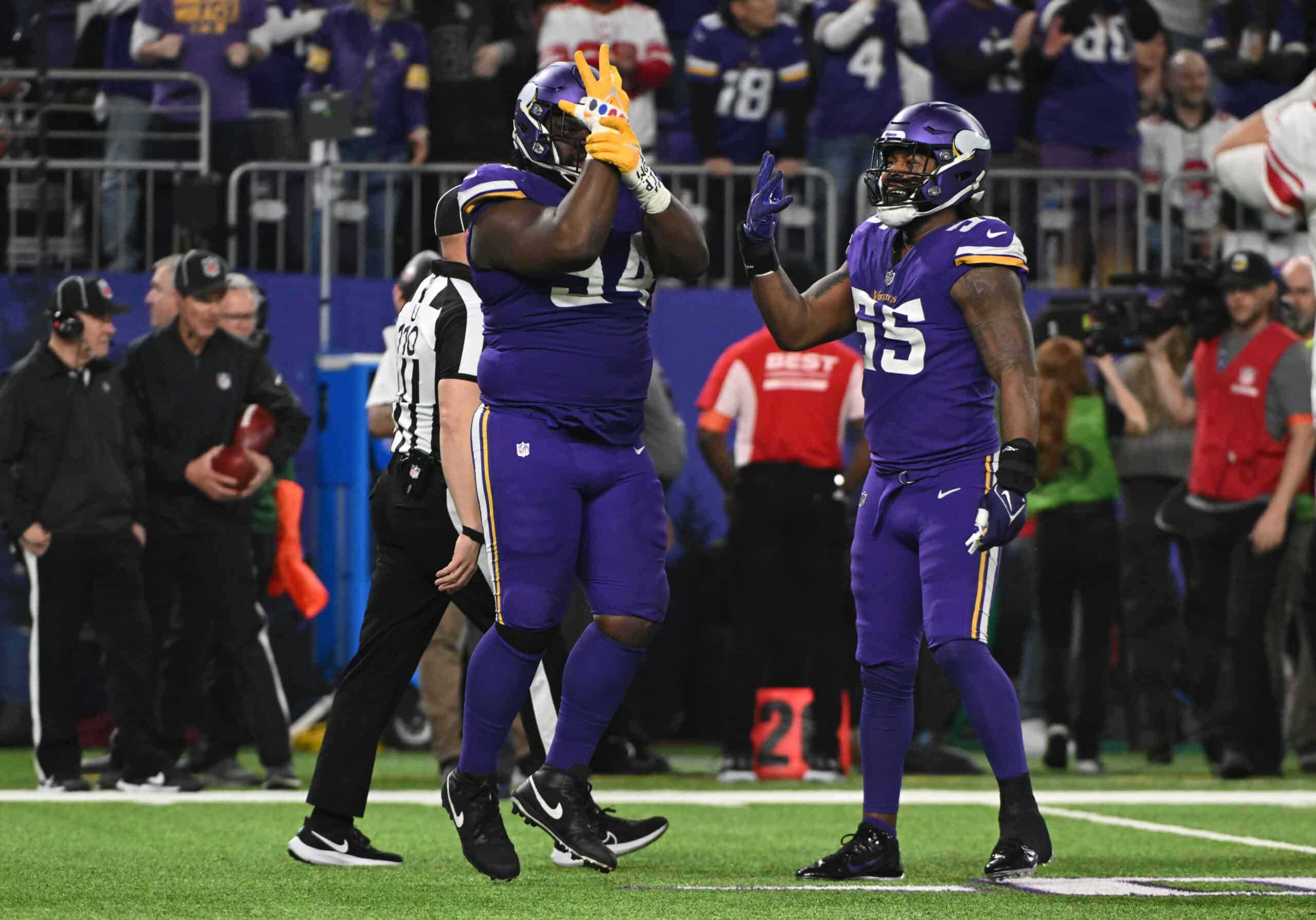 Dalvin Tomlinson #94 of the Minnesota Vikings reacts after a tackle during the third quarter against the New York Giants in the NFC Wild Card playoff game at U.S. Bank Stadium on January 15, 2023 in Minneapolis, Minnesota. 