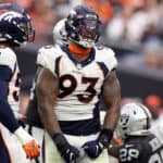 Dre'Mont Jones #93 of the Denver Broncos reacts in the fourth quarter against the Las Vegas Raiders at Allegiant Stadium on October 02, 2022 in Las Vegas, Nevada.