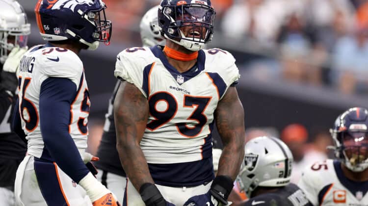 Dre'Mont Jones #93 of the Denver Broncos reacts in the fourth quarter against the Las Vegas Raiders at Allegiant Stadium on October 02, 2022 in Las Vegas, Nevada.