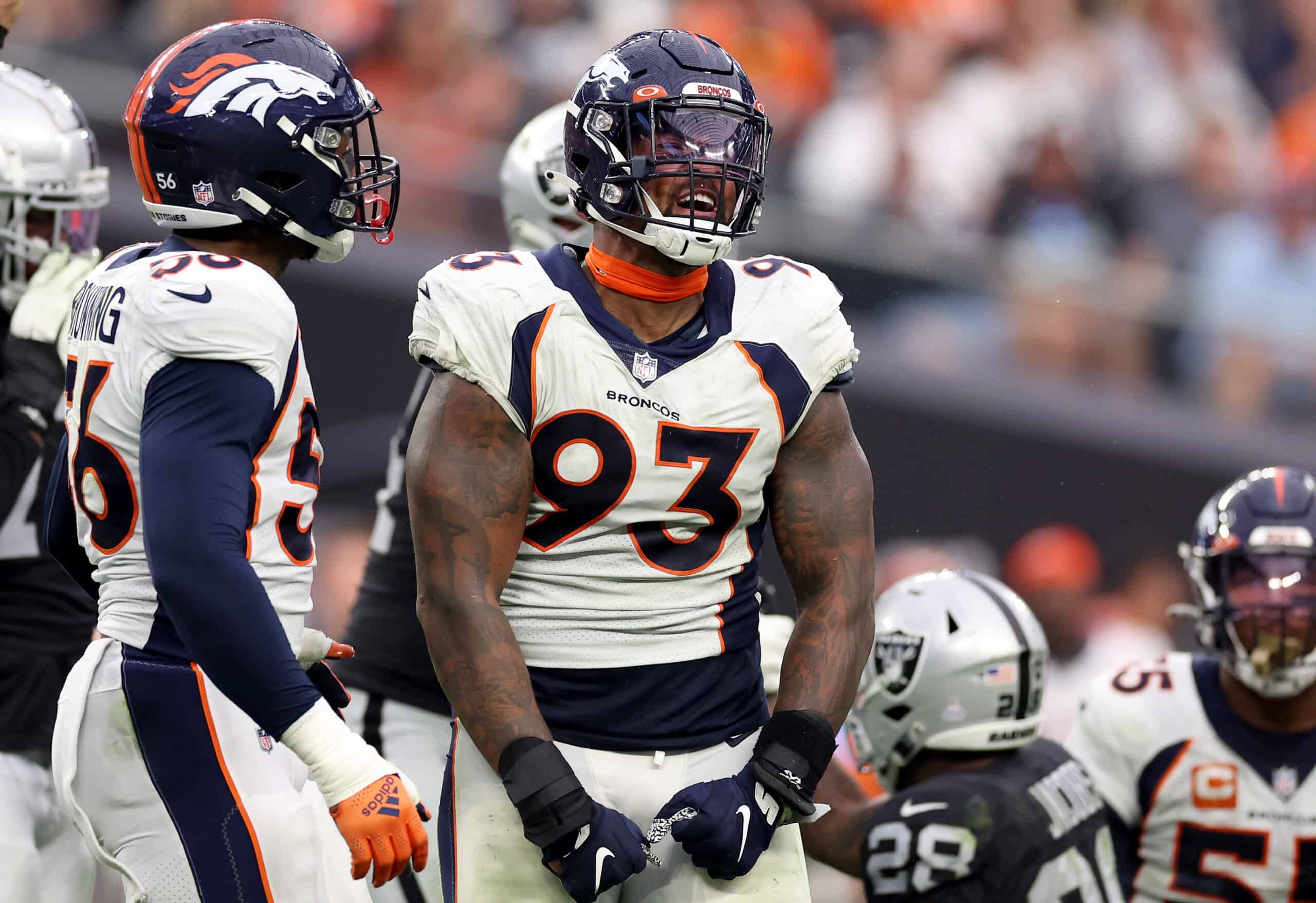 Dre'Mont Jones #93 of the Denver Broncos reacts in the fourth quarter against the Las Vegas Raiders at Allegiant Stadium on October 02, 2022 in Las Vegas, Nevada.