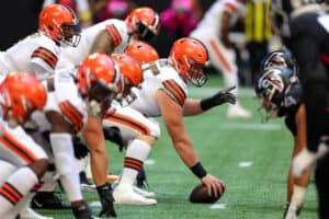 Ethan Pocic #55 of the Cleveland Browns prepares for a snap against the Atlanta Falcons during the first quarter at Mercedes-Benz Stadium on October 02, 2022 in Atlanta, Georgia.