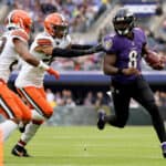 Lamar Jackson #8 of the Baltimore Ravens runs the ball during the second half against the Cleveland Browns at M&T Bank Stadium on October 23, 2022 in Baltimore, Maryland.