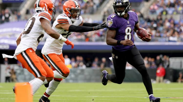 Lamar Jackson #8 of the Baltimore Ravens runs the ball during the second half against the Cleveland Browns at M&T Bank Stadium on October 23, 2022 in Baltimore, Maryland.