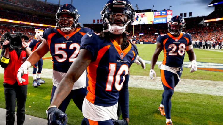 Jerry Jeudy #10 of the Denver Broncos celebrates a touchdown in the fourth quarter of a game against the Kansas City Chiefs at Empower Field At Mile High on December 11, 2022 in Denver, Colorado.