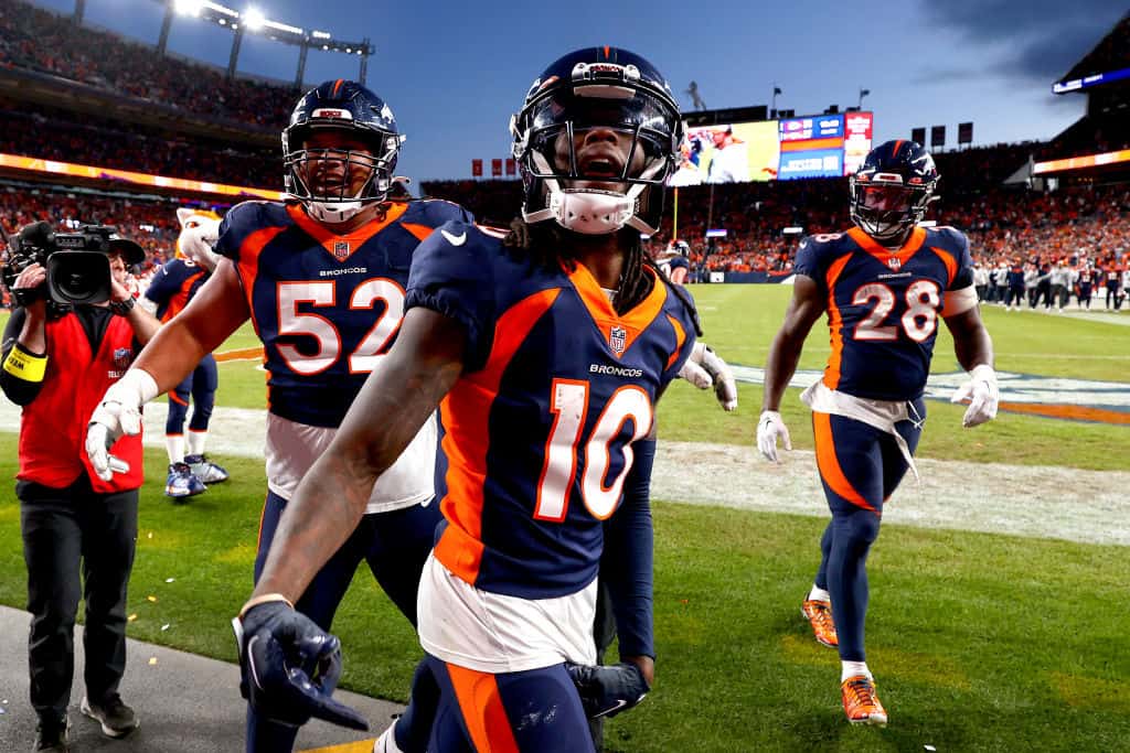 Jerry Jeudy #10 of the Denver Broncos celebrates a touchdown in the fourth quarter of a game against the Kansas City Chiefs at Empower Field At Mile High on December 11, 2022 in Denver, Colorado.