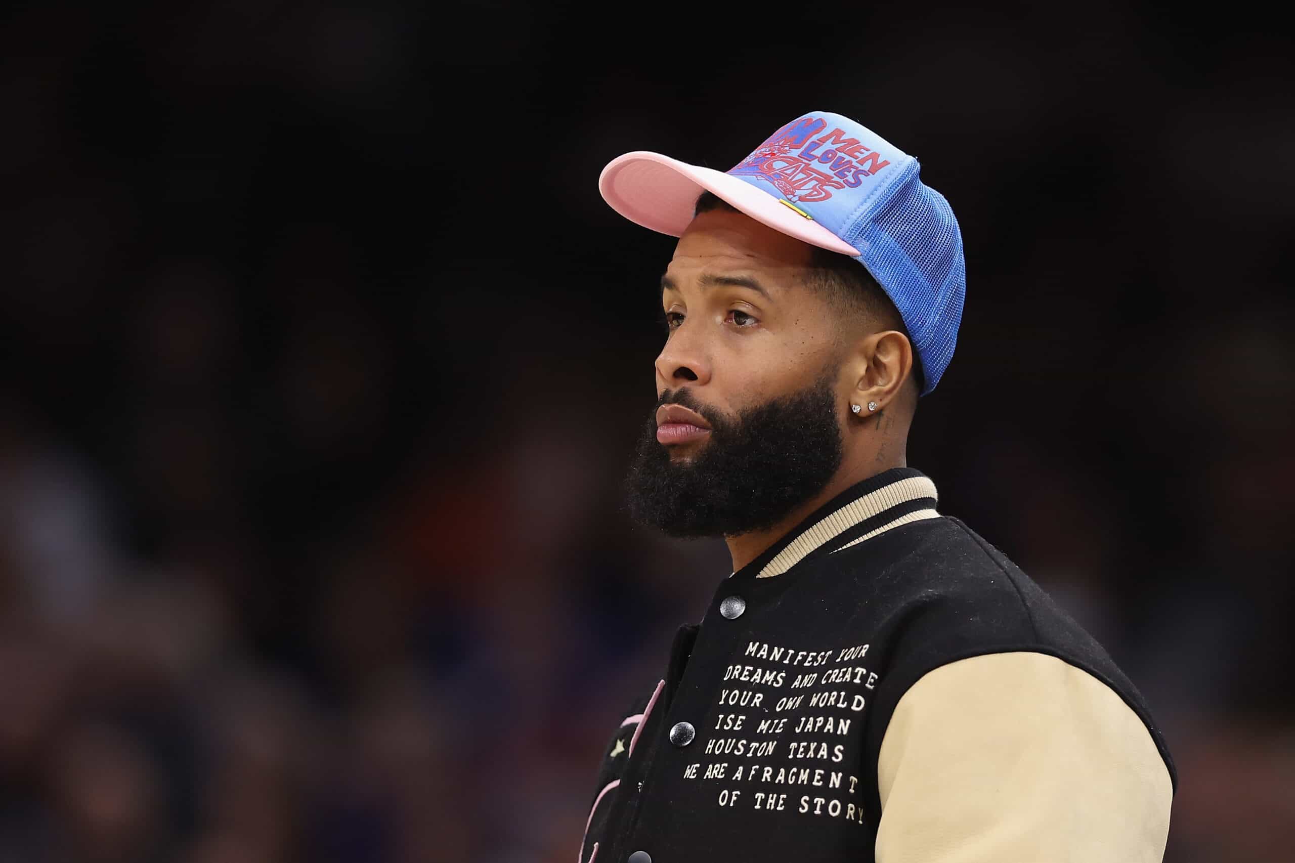 NFL athlete Odell Beckham Jr. attends the NBA game between the Phoenix Suns and the New Orleans Pelicans at Footprint Center on December 17, 2022 in Phoenix, Arizona. The Suns defeated the Pelicans 118-114. NOTE TO USER: User expressly acknowledges and agrees that, by downloading and or using this photograph, User is consenting to the terms and conditions of the Getty Images License Agreement.