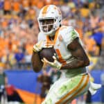 Cedric Tillman #4 of the Tennessee Volunteers makes a catch for 28-yard touchdown reception in overtime during the game against the Pittsburgh Panthers at Acrisure Stadium on September 10, 2022 in Pittsburgh, Pennsylvania.