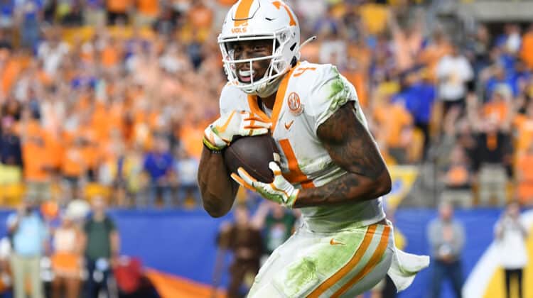 Cedric Tillman #4 of the Tennessee Volunteers makes a catch for 28-yard touchdown reception in overtime during the game against the Pittsburgh Panthers at Acrisure Stadium on September 10, 2022 in Pittsburgh, Pennsylvania.
