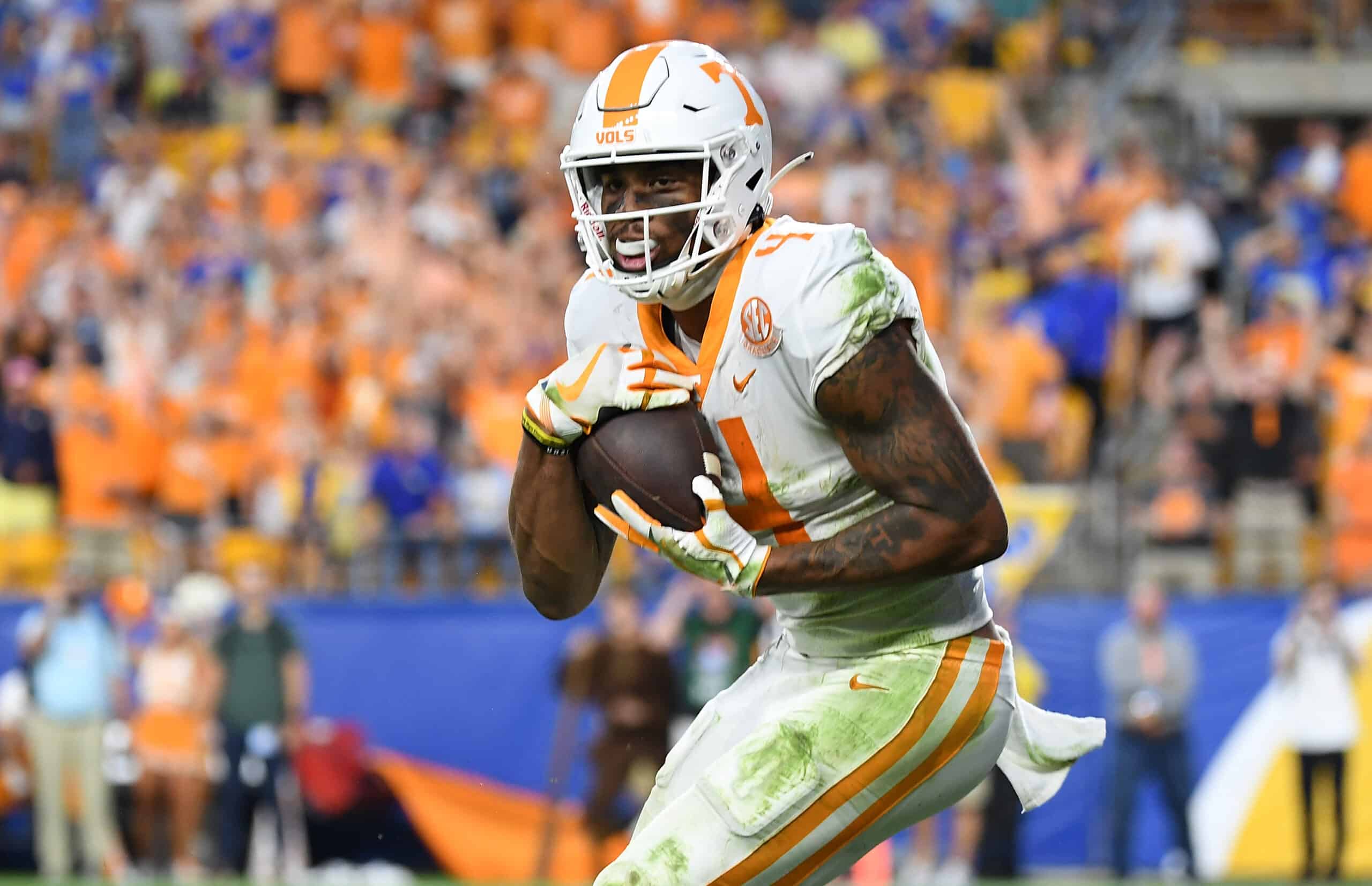 Cedric Tillman #4 of the Tennessee Volunteers makes a catch for 28-yard touchdown reception in overtime during the game against the Pittsburgh Panthers at Acrisure Stadium on September 10, 2022 in Pittsburgh, Pennsylvania.