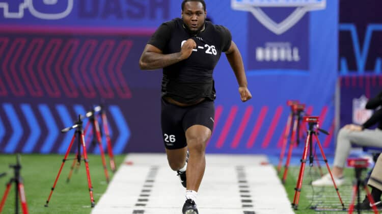 Dawand Jones of Ohio State participates in the 40-yard dash during the NFL Combine at Lucas Oil Stadium on March 05, 2023 in Indianapolis, Indiana.