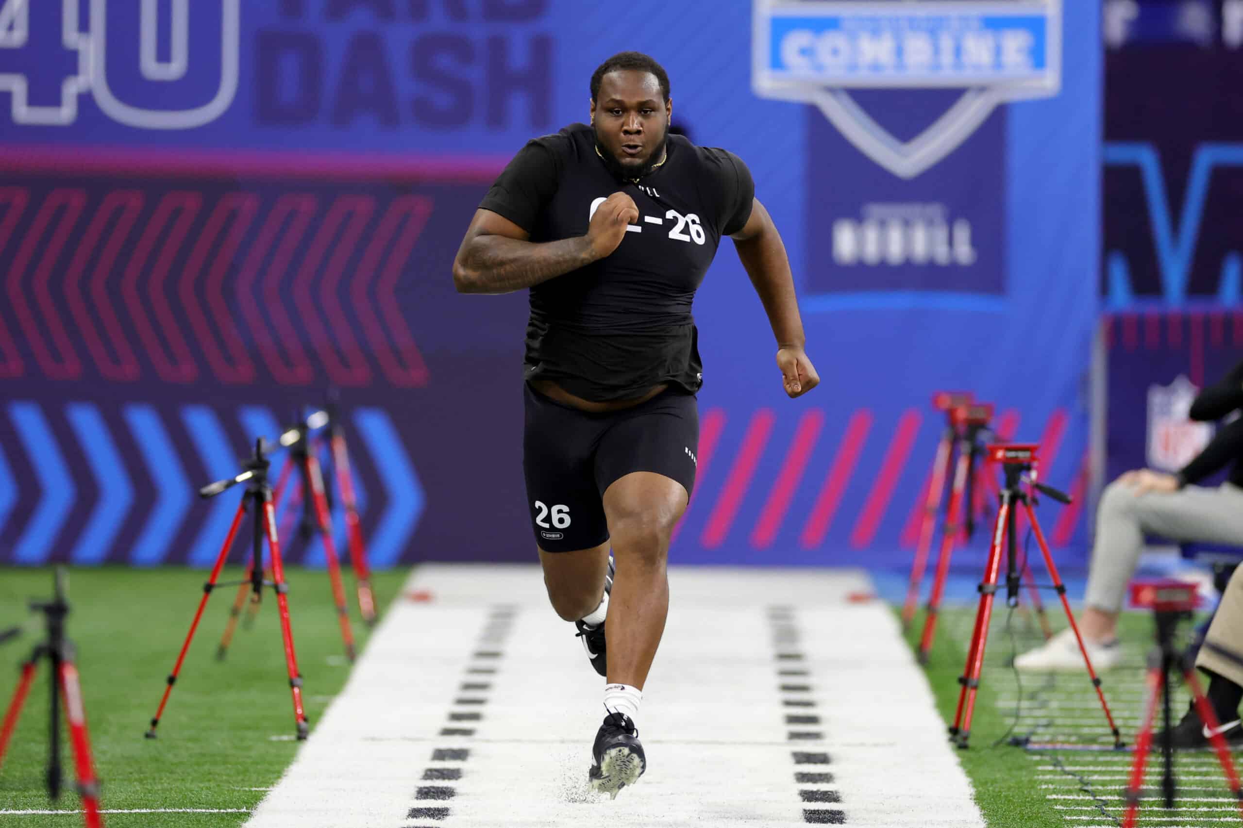 Dawand Jones of Ohio State participates in the 40-yard dash during the NFL Combine at Lucas Oil Stadium on March 05, 2023 in Indianapolis, Indiana.