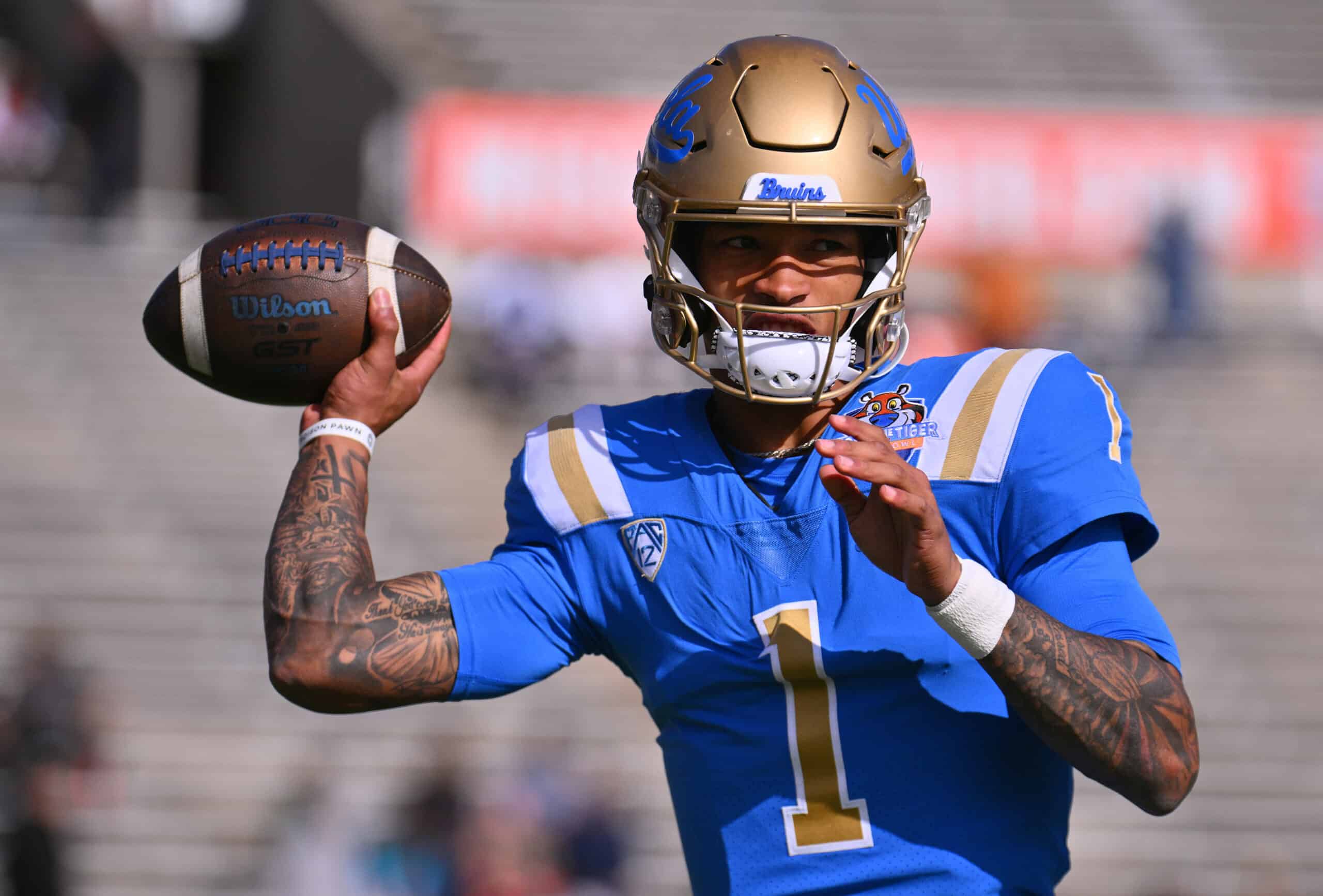 Quarterback Dorian Thompson-Robinson #1 of the UCLA Bruins warms up before his team's game against the Pittsburgh Panthers in the Tony the Tiger Sun Bowl game at Sun Bowl Stadium on December 30, 2022 in El Paso, Texas. 