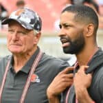 Cleveland Browns co-owner Jimmy Haslam talks with General Manager Andrew Berry during the fourth quarter of a preseason game against the Philadelphia Eagles at FirstEnergy Stadium on August 21, 2022 in Cleveland, Ohio. The Eagles defeated the Browns 21-20.
